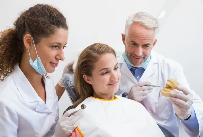 Woman being counselled before a dental surgery